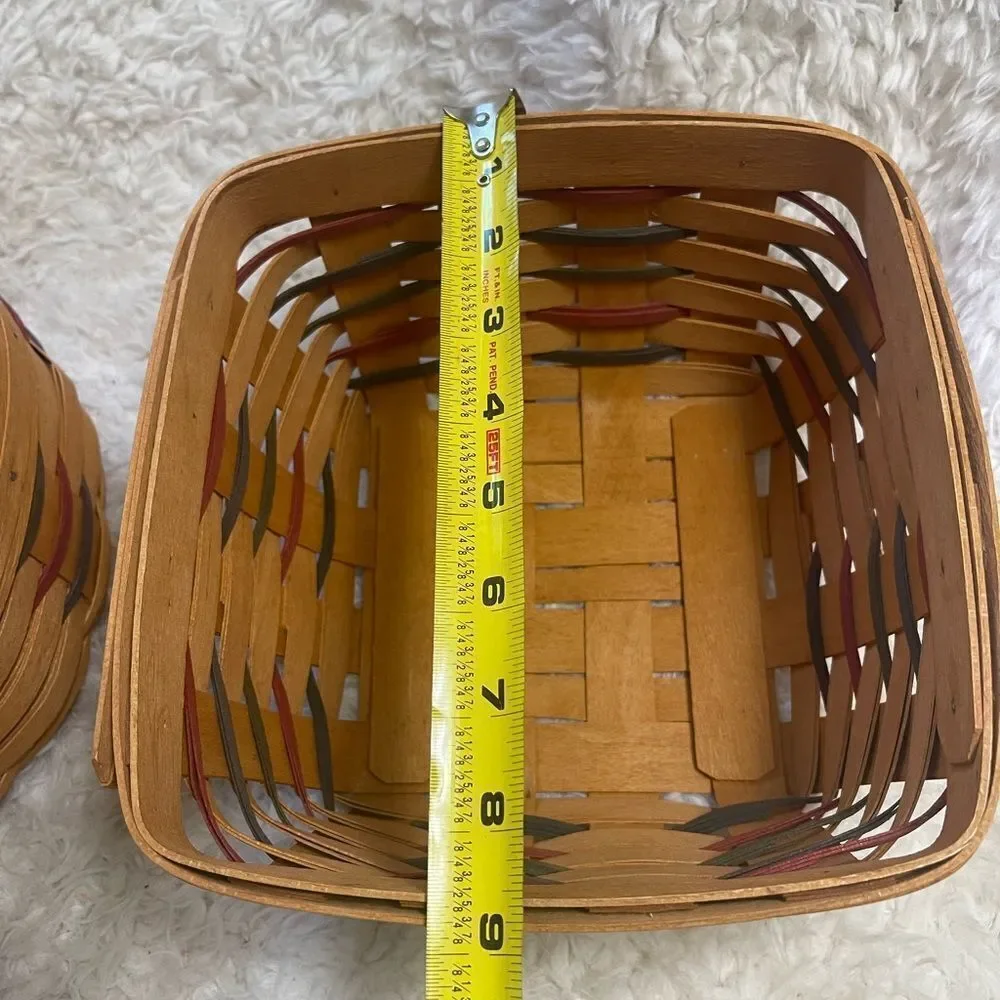 Longaberger 1995 set of two Handcrafted round and Square Woven baskets .